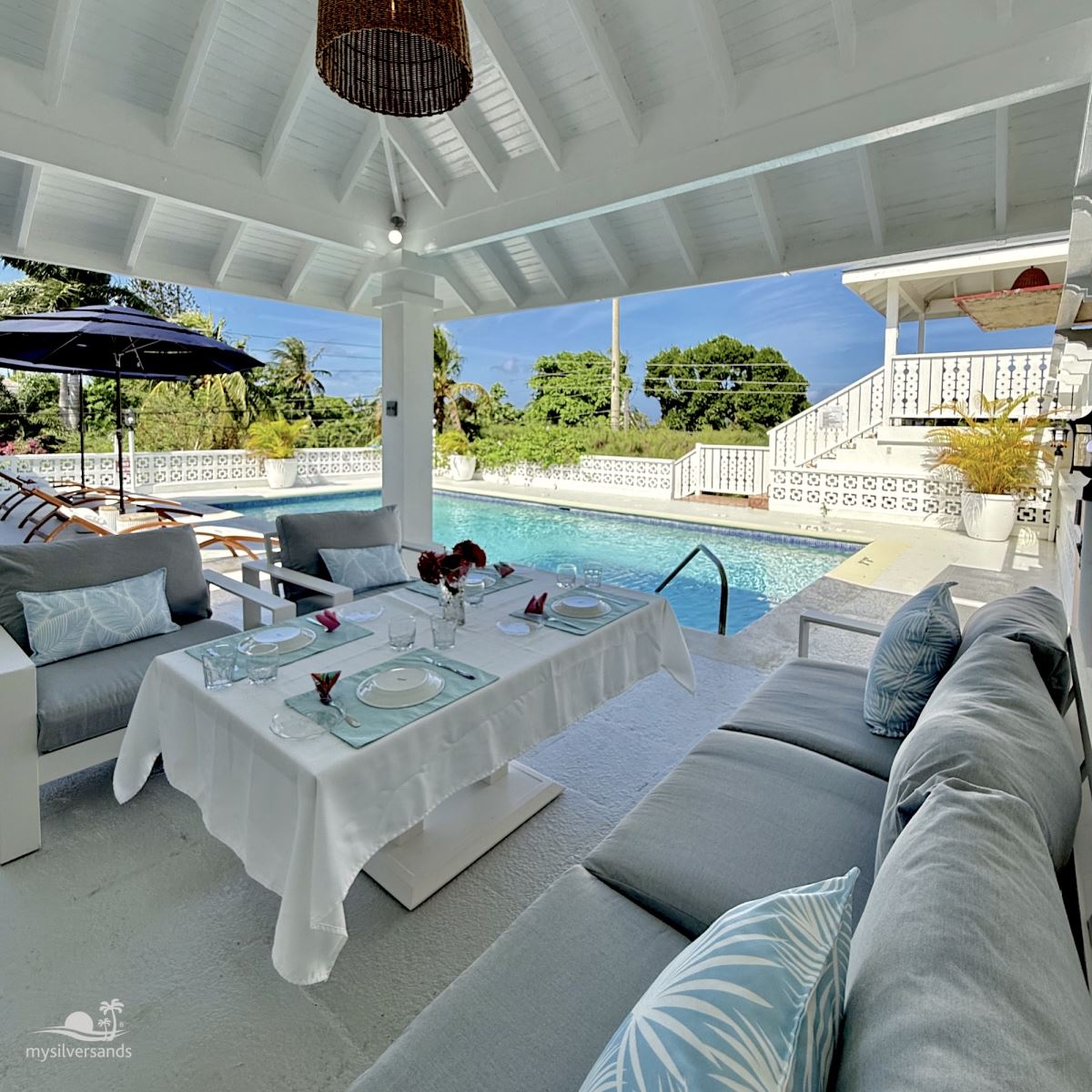 covered lounging area poolside