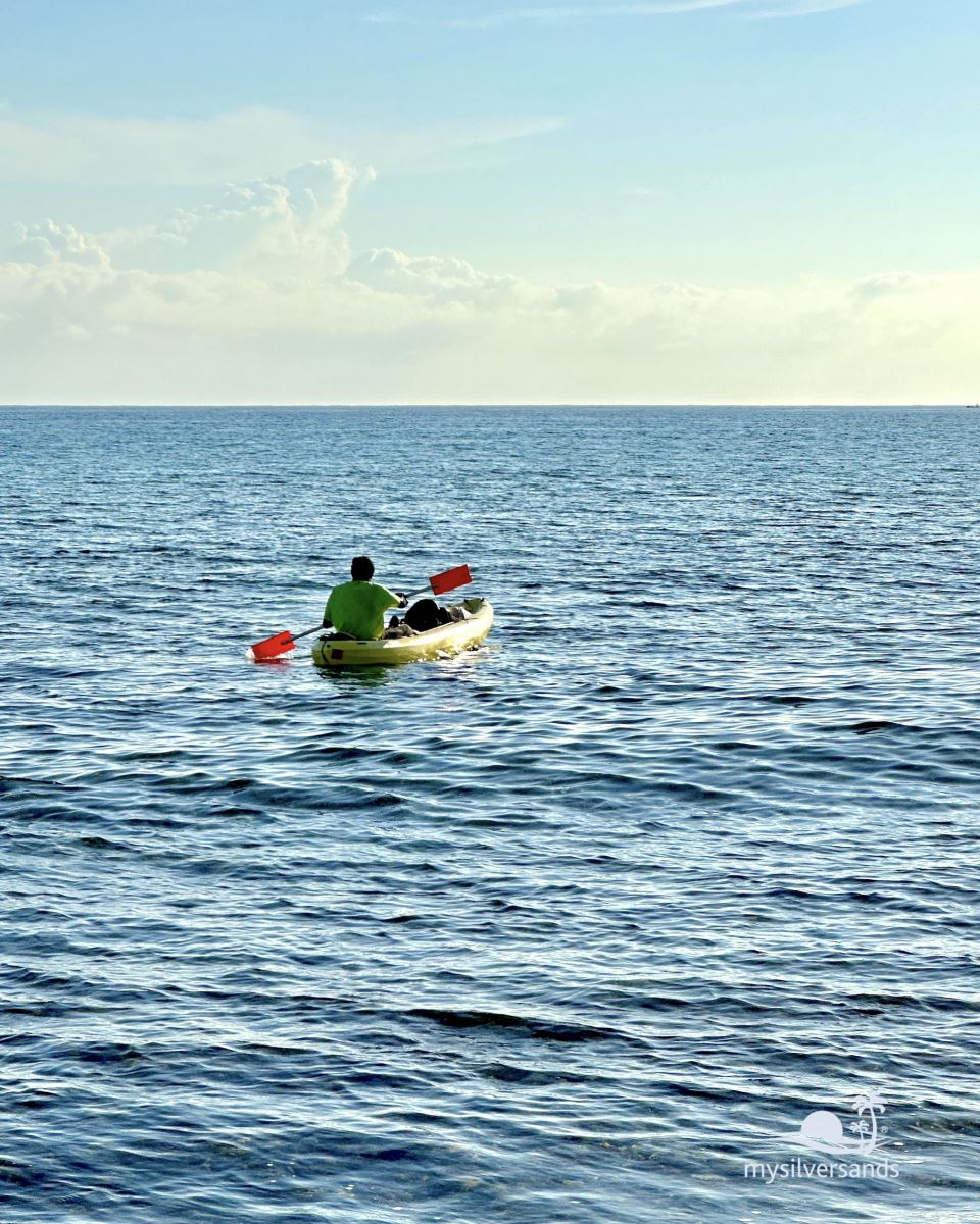 shine paddling away in his new kayak